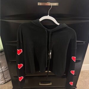 Black Hoodie with Red Heart Accents